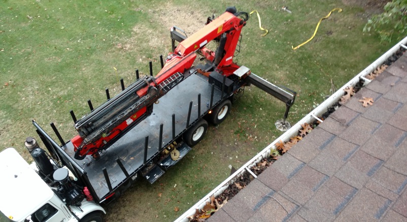 Storm damage tree removal off roof